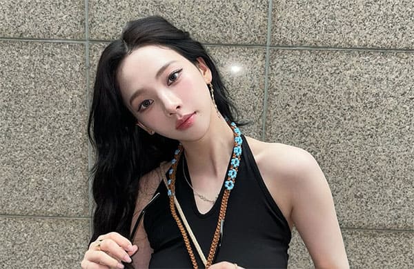 aespa's Karina Stuns in Chic Black Halter Top and Denim Look
